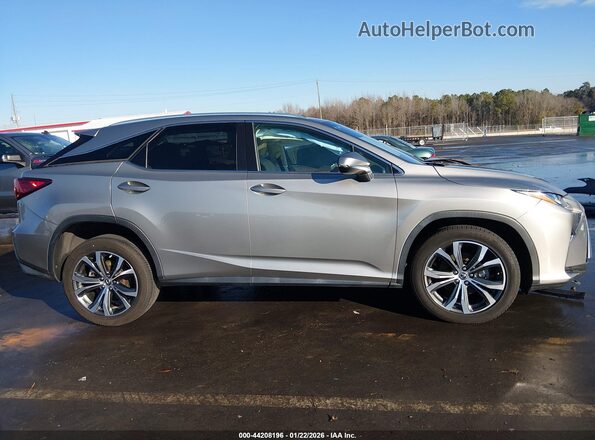 2T2ZZMCA2JC093504 2018 LEXUS RX 350 Золотой Вид задней части салона