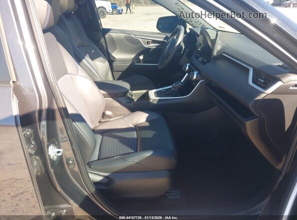 2T3E6RFV0PW042072 2023 TOYOTA RAV4 HYBRID Gray Widok wnętrza z przodu