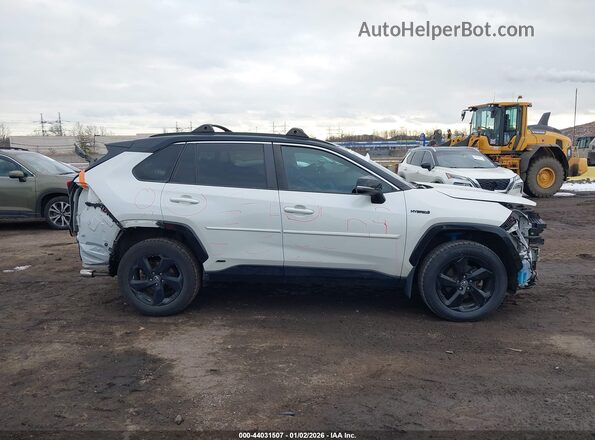 2T3EWRFV6LW070288 2020 TOYOTA RAV4 HYBRID Белый Вид задней части салона