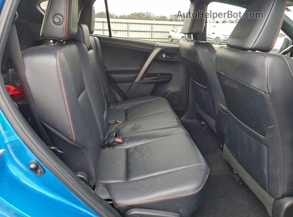 2T3NFREV8GW258415 2016 TOYOTA RAV4 Blue Vista de los asientos traseros