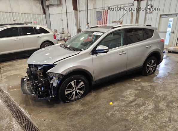 2T3RFREV8GW509323 2016 TOYOTA LE Silver Przód lewy
