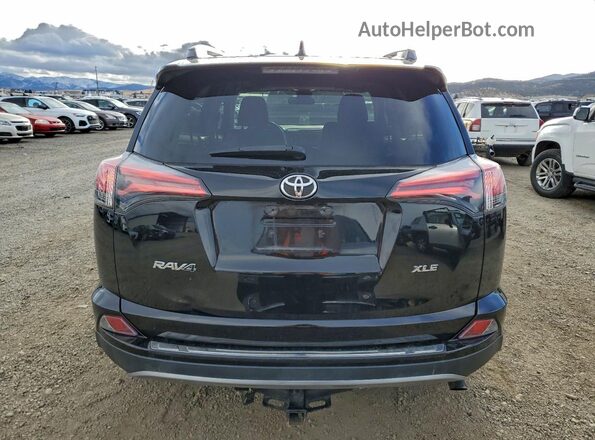 2T3WFREV7JW462103 2018 TOYOTA RAV4 Black Widok z tyłu