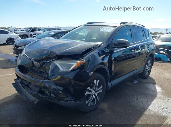 2T3ZFREV6JW515631 2018 TOYOTA LE Black Przód lewy