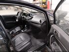 2018 Ford Fiesta Titanium Черный vin: 3FADP4FJXJM139559