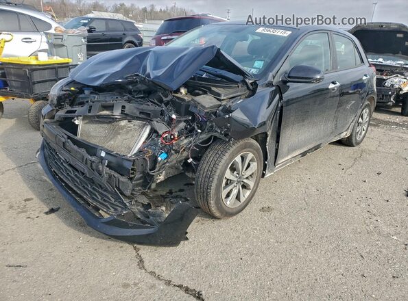 3KPA25AD6ME375367 2021 KIA RIO Black Vista tres cuartos delantera izquierda