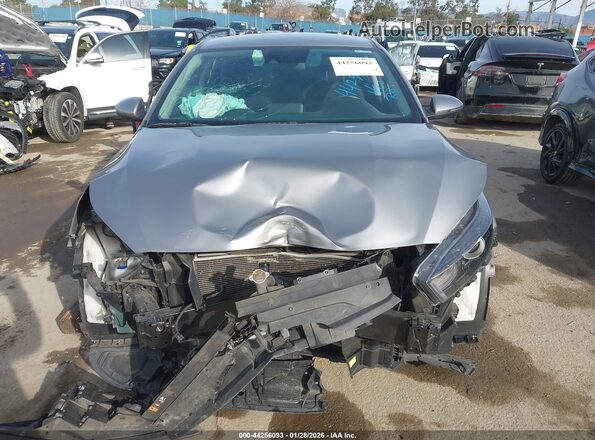 3KPF24AD5PE607302 2023 KIA FORTE Серебряный Вид спереди