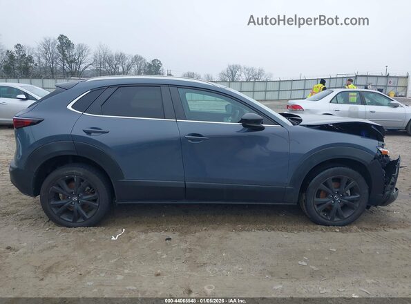 3MVDMBCM6PM525375 2023 MAZDA CX-30 Light Blue Вид задней части салона