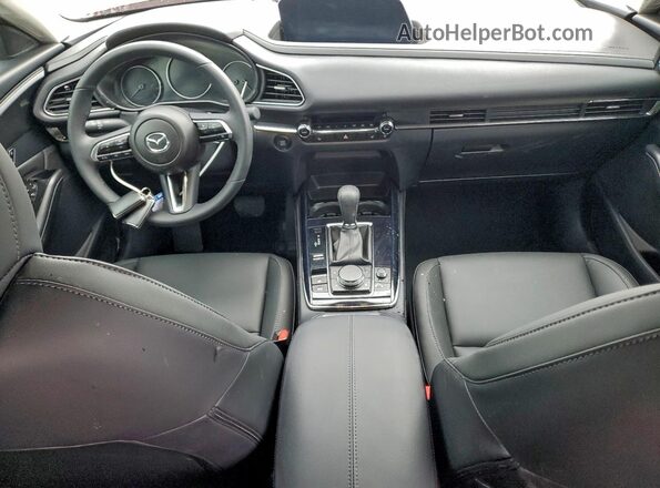 3MVDMBCMXSM856811 2025 MAZDA CX-30 Maroon Dashboard view