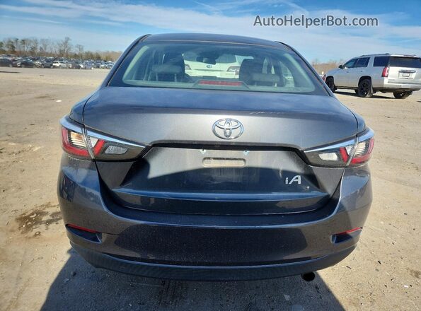 3MYDLBYV2JY323415 2018 TOYOTA YARIS Серый Вид сзади