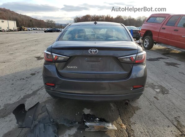 3MYDLBYV5KY516420 2019 TOYOTA YARIS Серый Вид сзади