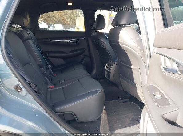 3PCAJ5JR7PF103181 2023 INFINITI QX55 Light Blue Vista de la etiqueta del VIN