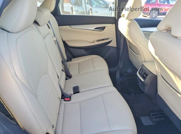 3PCAJ5M13LF109821 2020 INFINITI QX50 White Vista interior trasera