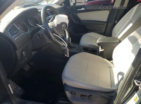 3VV3B7AX1KM108012 2019 VOLKSWAGEN TIGUAN Зеленый Вид салона спереди