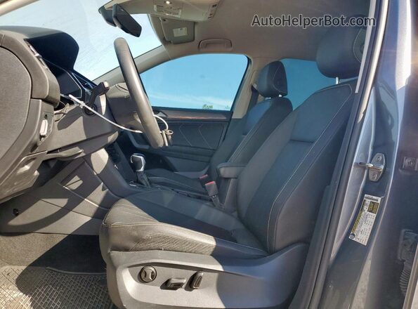 3VV3B7AX8PM085240 2023 VOLKSWAGEN TIGUAN Charcoal წინა სალონის ხედი