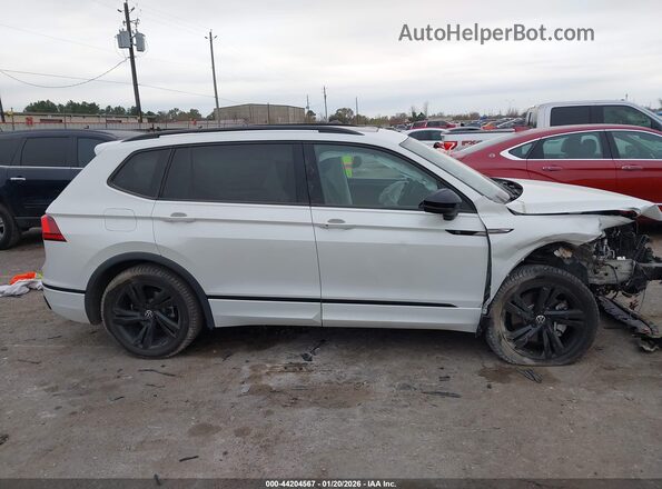 3VVCB7AX7PM072916 2023 VOLKSWAGEN TIGUAN White Սալոնի հետևի տեսք