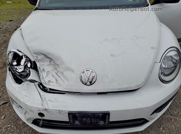 3VWF17ATXHM607392 2017 VOLKSWAGEN BEETLE White Rear interior view