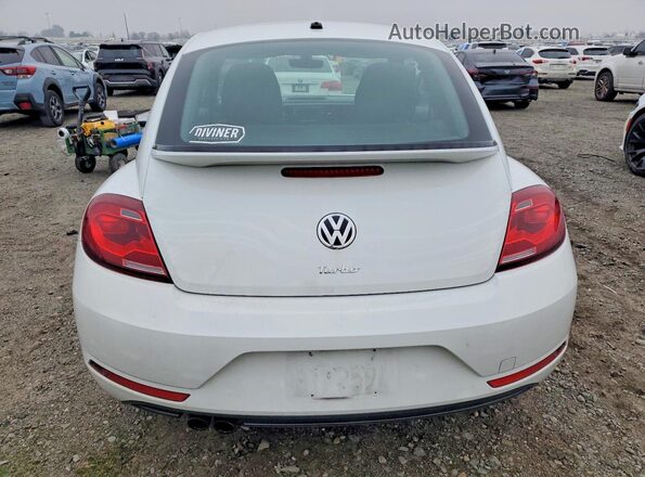 3VWF17ATXHM607392 2017 VOLKSWAGEN BEETLE White Rear view