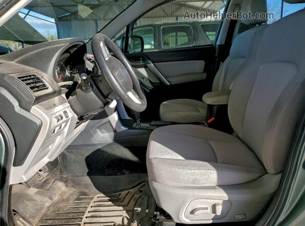 JF2SJADC1GH538221 2016 SUBARU FORESTER 2.5 Зеленый Вид панели приборов