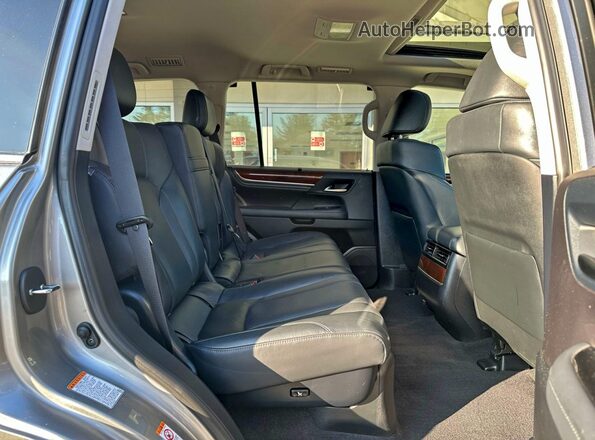 JTJHY7AX5K4282516 2019 LEXUS LX Gold Widok wnętrza z przodu