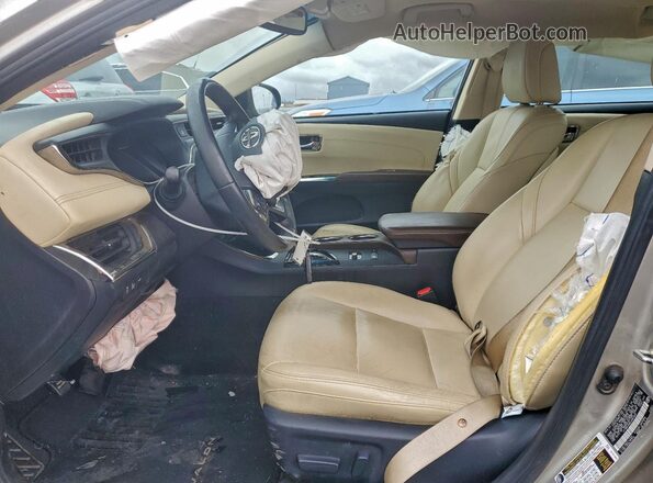 4T1BD1EB9JU061057 2018 TOYOTA AVALON Золотой Вид салона спереди