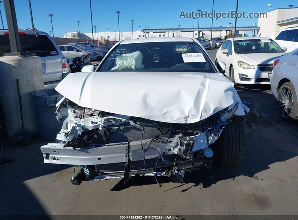 4T1DAACK9SU631256 2025 TOYOTA CAMRY White Սալոնի հետևի տեսք