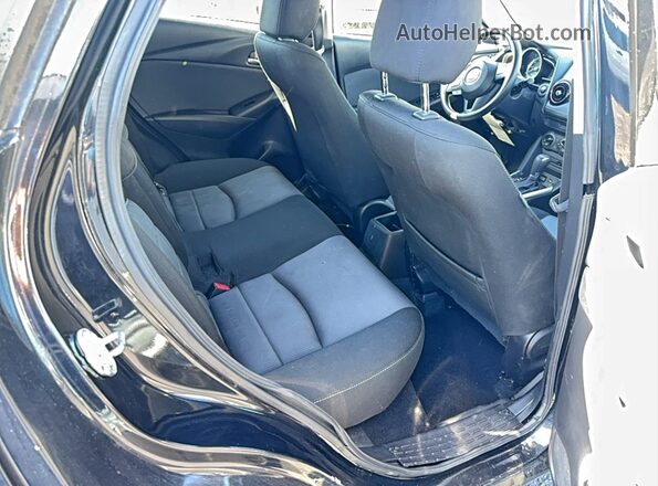 JM1DKBB71G0123172 2016 MAZDA CX-3 Черный Вид салона спереди