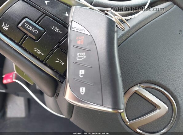 58ADA1C19PU033949 2023 LEXUS ES 300H Gold Widok deski rozdzielczej