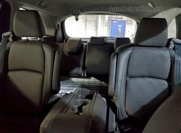 5FNRL6H70JB058390 2018 HONDA ODYSSEY Black Vista de los asientos traseros