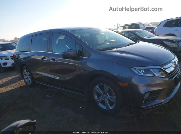 5FNRL6H73JB071652 2018 HONDA ODYSSEY Gray Widok wnętrza z tyłu