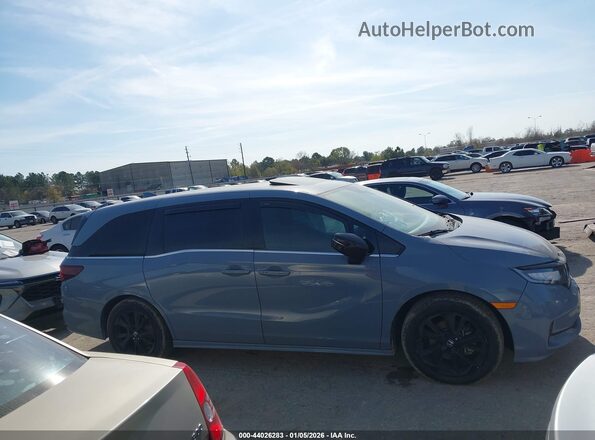 5FNRL6H77PB058928 2023 HONDA ODYSSEY Gray Widok wnętrza z tyłu