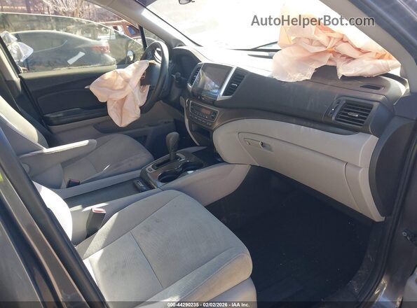 5FNYF5H31HB036791 2017 HONDA PILOT Серый Вид салона спереди