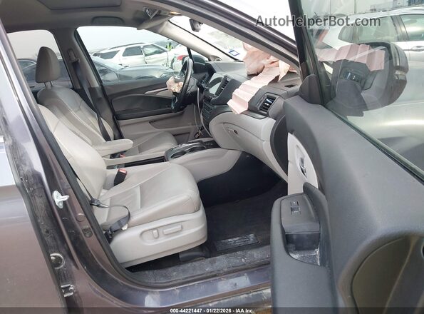 5FNYF5H5XMB044352 2021 HONDA PILOT Серый Вид салона спереди