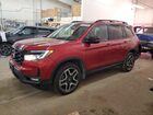 2023 Honda Passport Elite Red vin: 5FNYF8H03PB036443