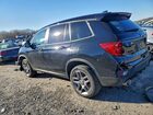 2023 Honda Passport Exl Черный vin: 5FNYF8H52PB037885