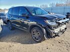 2023 Honda Passport Exl Черный vin: 5FNYF8H52PB037885