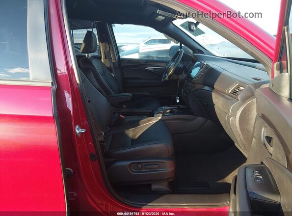 5FNYF8H56PB011905 2023 HONDA PASSPORT Красный Вид салона спереди