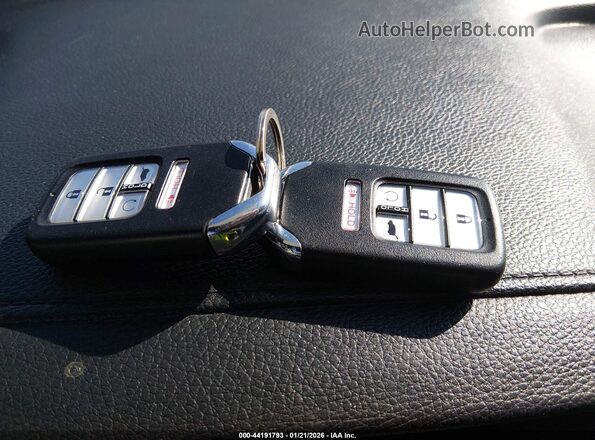 5FNYF8H56PB011905 2023 HONDA PASSPORT Красный Вид панели приборов
