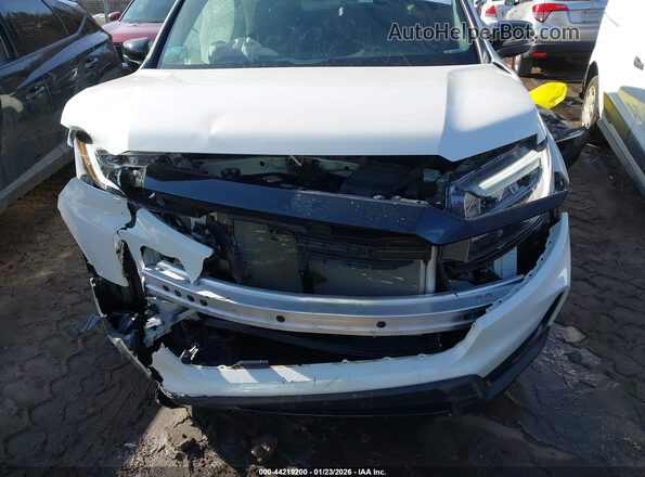 5FNYF8H80RB007409 2024 HONDA PASSPORT Белый Вид задней части салона