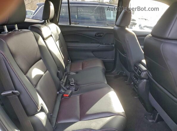 5FNYF8H81RB013770 2024 HONDA PASSPORT Белый Вид задней части салона