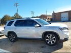 2023 Honda Pilot 2wd Touring White vin: 5FNYG2H71PB003593