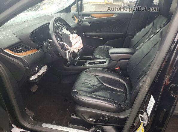 5LMCJ2D95KUL44295 2019 LINCOLN MKC Черный Вид салона спереди