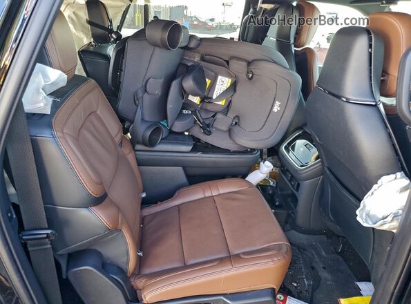 5LMJJ3LG9REL21152 2024 LINCOLN NAVIGATOR Черный Вид задней части салона