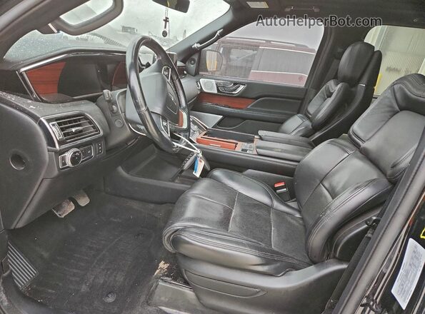 5LMJJ3LTXMEL12689 2021 LINCOLN NAVIGATOR Black Front interior view