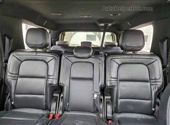 5LMJJ3LTXMEL12689 2021 LINCOLN NAVIGATOR Black Rear seats view