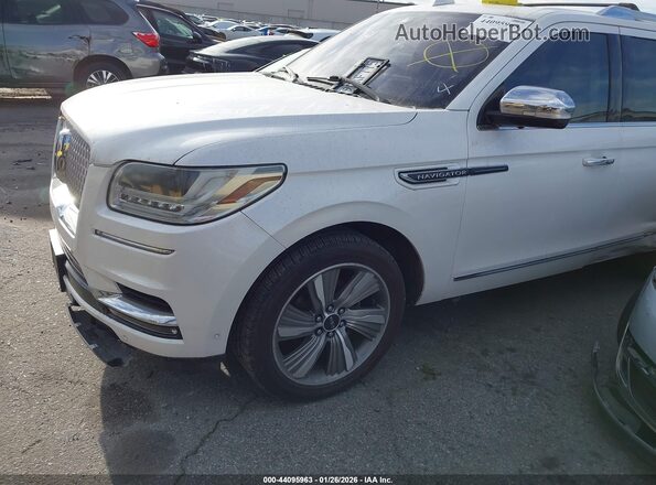 5LMJJ3TT1JEL18053 2018 LINCOLN NAVIGATOR L Белый Передняя левая четверть