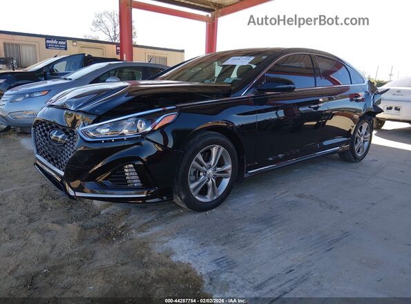 5NPE34AF0KH731069 2019 HYUNDAI SONATA Black Vista tres cuartos delantera izquierda