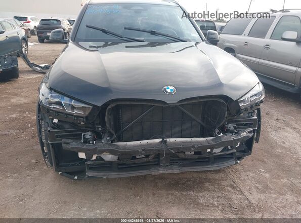 5UX13EU06T9053030 2026 BMW X5 Черный Вид задней части салона
