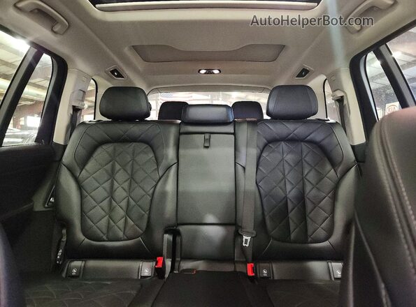5UX23EM00P9S06012 2023 BMW X7 Black Սալոնի հետևի տեսք