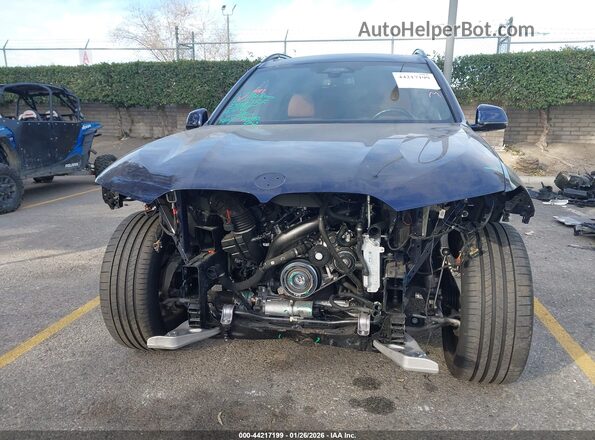 5UX23EM00R9S13092 2024 BMW X7 Dark Blue Вид задней части салона