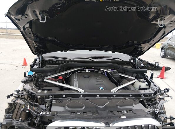 5UX23EM01S9Z62795 2025 BMW X7 Black Vista trasera